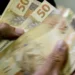 Cédulas e moedas de real brasileiro