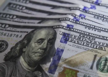 Cédulas e moeda de dólar americano