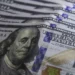 Cédulas e moeda de dólar americano
